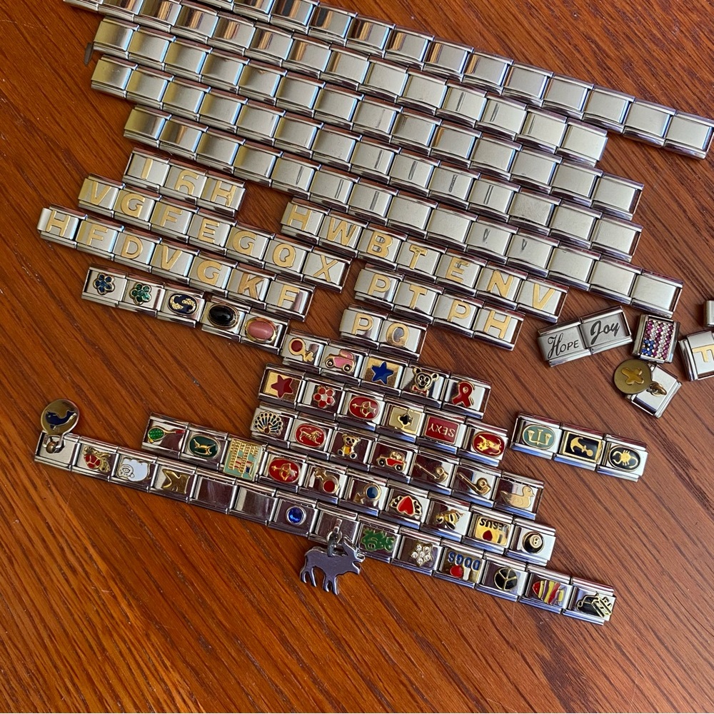 NWOT Italian stainless steel charms. Large lot